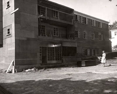 Sandra Berman admiring the Pi Beta Phi house while it is under construction on 507 Idaho Avenue.