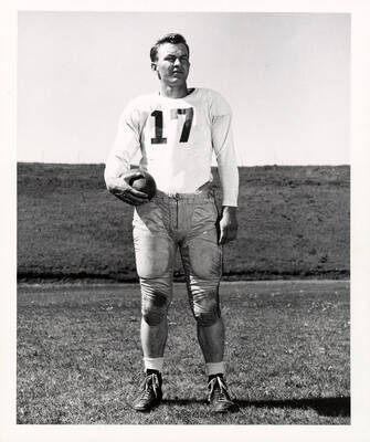 Quarterback for the University of Idaho football team, Wayne Anderson (#17), standing on the field.