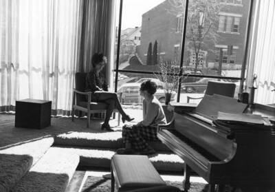 Marilyn Boyd and Victoria Taylor relax in the living room of the new Kappa Alpha Theta house