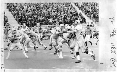 A crowded audience watches as the Vandals prepare to throw the ball away from the opposing team.