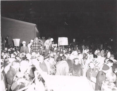 Students and faculty gathered outside of University of Idaho President Ernest Hartung's residence to show support for his policies and involvement in the campus.