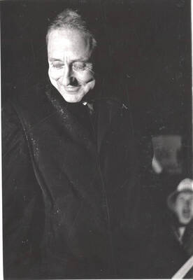 University of Idaho President Ernest W. Hartung stands before the crowd gathered in support of his administration in front of his house.
