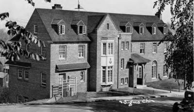 Sigma Chi house, located at 620 Idaho Avenue on the University of Idaho campus. Caption reads '~Sigma Chi~'
