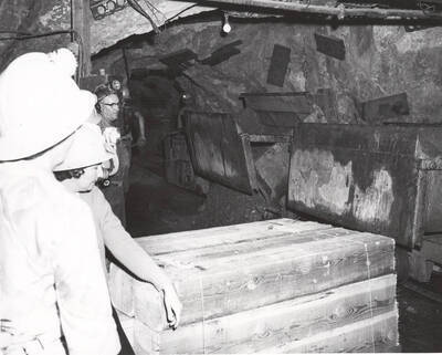 Students view ore cars in operation at the Lucky Friday Mine in Mullan, Idaho.