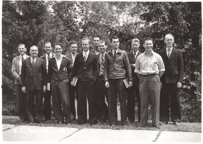 Group photo of the Electrical Engineers club members standing outside together. Caption reads: 'E.E. Seniors- 1940'.