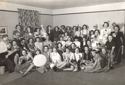 Women of Ridenbaugh Hall are dressed in costumes for the Freshman party.