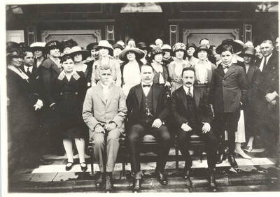 President Obregon of Mexico sits for a photograph with a group of American students at the National Autonomous University of Mexico. Mexico's Minister of Education, Jose at the President's left.