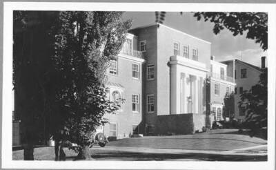 An angled photo of Sigma Nu house, located at 718 Elm Street.