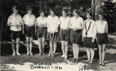 The Women's Recreation Association baseball team poses for a photo together. Caption reads 'Women's Baseball-1930, 15 cents.'