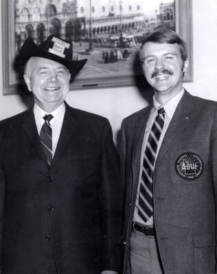 ASUI President Jim Willms presents Idaho Senator Len Jordan with a 'Vandal Bad Guy Black Hat' in Washington as part of 'All Idaho Week' held at the University of Idaho.
