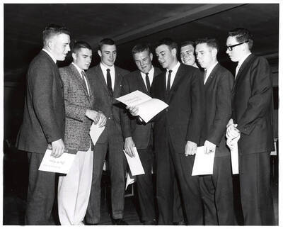 University of Idaho students stand together and receive the Sears-Roebuck Foundation scholarships.