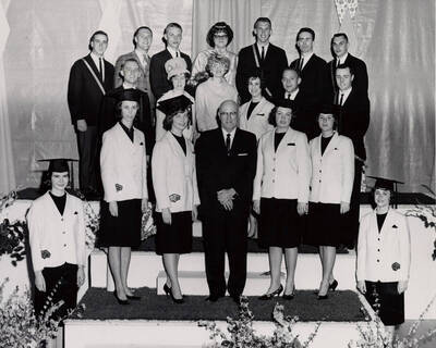 President Donald R. Theophilus stands for a group photo with the outstanding seniors.