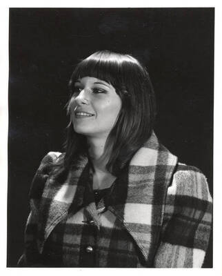 Ms. Cutler sits for a portrait.