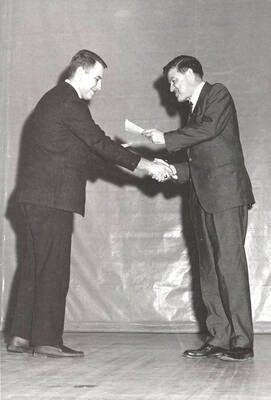 Michael S. Wright receives the first Frank Church Conservation Award from Senator Frank Church.