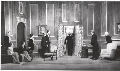 From l-r: Dorothy Greaves as Lady Caroline, Patricia Barnes as Alice Dearth, Margaret Payne as Mrs. Coade, Guy Terwilleger asMr. Coade, William Davidson as Mr. Dearth, Richard Paterson as Mr. Purdie and John Rowe as Lob. Idaho students act out the living-room scene of 'Dear Brutus.' An ASUI production directed by Jean Collette in the University of Idaho Auditorium.