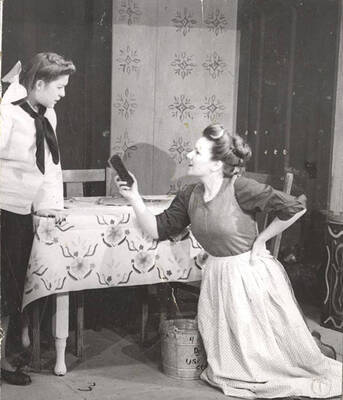 Mama, played by Marjorie Dean, talks from a stoop to Katrin, played by Darlene Henderson, in Idaho drama's production of 'I Remember Mama.' An ASUI production directed by Jean Collette in the University Auditorium.