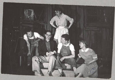 From l-r: Keith Keefer as Elmo, Harry Dalva as Commodore, Marie Hargis as Mrs. Crochet, Kenneth Keefer as Fleece and Colleen Christensen as Evvie. The performers sit and converse in Idaho drama's production of 'The Great Big Doorstep.' An ASUI production directed by Jean Collette in the University Auditorium.