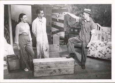Performers from l-r: Karleen Randall as Annabelle Fuller, Edward Dalva as Newton Fuller, and J.G. Peterson as Mr. Kimber. Mr. Kimber talks to Peterson and Fuller in Idaho drama's production of 'George Washington Slept Here.' An ASUI production directed by Jean Collette.
