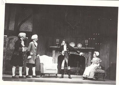 Performers from l-r: Jack Muller as Hastings, Cope Gale as Hardcastle, Gene Roth as Marlowe and Helen Gale as Miss Hardcastle. Hardcastle talks, pointing at Miss Hardcastle in Idaho drama's production of 'She Stoops to Conquer.' An ASUI production directed by Jean Collette in the University Auditorium.