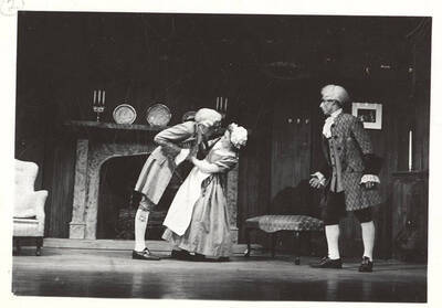 Performers from l-r: Gene Roth as Marlowe, Helen Gale as Miss Hardcastle and Cope Gale as Hardcastle. Miss Hardcastle refuses Marlowe's advances in Idaho drama's production of 'She Stoops to Conquer.' An ASUI production directed by Jean Collette in the University Auditorium.