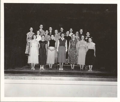 University of Idaho drama workshop students smile as they participate in a choral reading exercise.