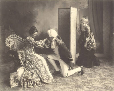 Edna Moore as Lydia Languish, Homer David as Captain Absolute and Edna Clayton as Mrs. Malaprop in Idaho drama's production of "The Rivals." Directed by Aurelia Henry.