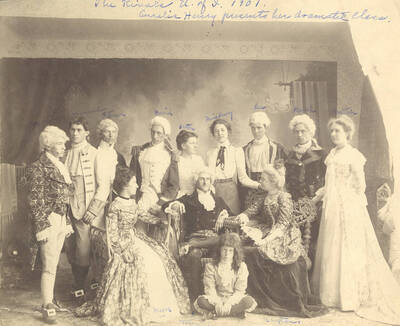 Students from left to right, standing: Ben Oppenheim, John McConnell, Andrew Peterson, Homer David, Nellie Ireton, A. Henry, William Lee, B. French, Mabel Martyn; seated: Edna Moore, Fred McConnell, A. Foster, Anna Edna Clayton. Idaho drama performers pose for a full cast photograph for the school's production of "The Rivals." Directed by Aurelia Henry.