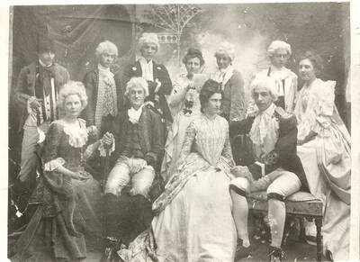 Students from left to right, standing: John McConnell, Ben Oppenheim, William Lee, Nellie Ireton, W. Griffin, Henry Sweet, Mable Martyn; seated: Anna Edna Clayton, Fred McConnell, Edna Moore, Homer David. Idaho drama students pose in costume for the production of "The Rivals." Directed by Aurelia Henry.