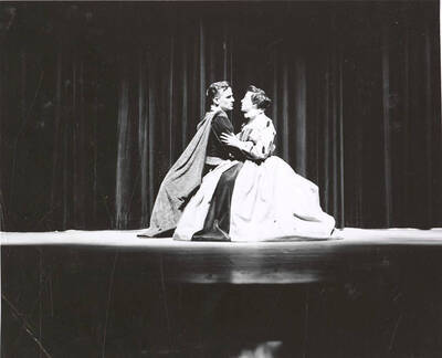 J. Madison and Janet Biker hold each other during Idaho drama's production of "Mary of Scotland." ASUI Dramatics production directed by Jean Collette in the University Auditorium.