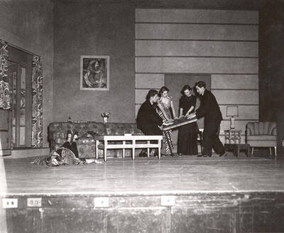 Shirley Lent, Gary Leaverton, Sharon Henderson, Rosemary Rowell, Stowell Johnson perform a group scene together during a drama production of 'Blithe Spirit'. An ASUI production directed by Jean Collette.