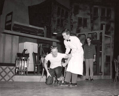 Tom Wright, Paul Ackerman and Cal Riggs rehearse for the drama production 'Death of a Salesman'. ASUI production in the University Auditorium and directed by Jean Collette.