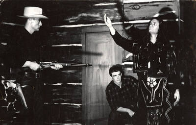 Norman Green, Larry Hyer and an unidentified individual in period costume during a drama production of 'No More Frontier'. ASUI production written by Talbot Jennings, directed by Jean Collette in the University Auditorium.