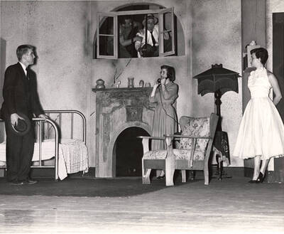 Charles Tovey, Nancy Benfer and Shirley Turner perform together on stage during a drama production of 'My Sister Eileen'. ASUI production of "My Sister Eileen" directed by Jean Collette.