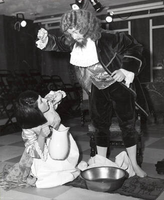 James Hutcherson performing as Orgon and Michael Ann Sheehy. ASUI production in the U-Hut Arena Theatre directed by Forrest Sears.