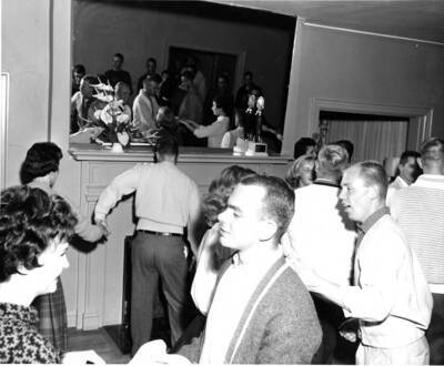 People dance at the Alpha Gamma Delta Nickel Hop.
