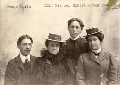 University of Idaho students Homer David, Ella Yeager, Elbert Moody and Lucy Fisher sit together for a picture.