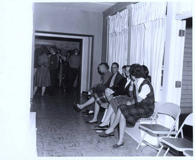 Seven students take a break from dancing at the Kappa Kappa Gamma Nickel Hop.