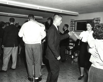 A group of people dance at the Gamma Phi Beta Nickel Hop.