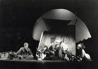 Scene from the University of Idaho drama production of "Noah." This production was directed by Jean Collette. The actors can be seen sitting on stage, dressed in their costumes.