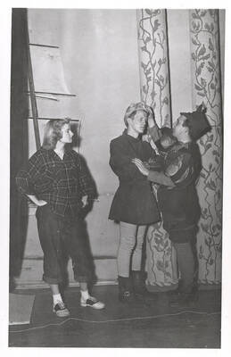 The ASUI production of "Twelfth Night." John Gregory as Fest and Dale Kassell as Fabian. Directed by Jean Collette in the University Auditorium, costumes by Marion Featherstone.