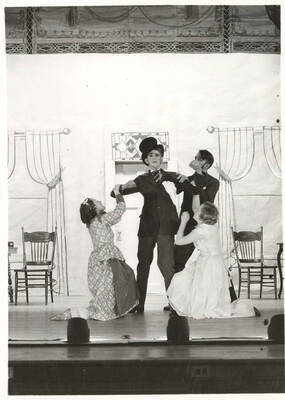 The University of Idaho drama production of "The Drunkard." Directed by Fred Blanchard, set by Theodore Prichard, scenic assistant Mary Kirkwood and costumes Marion Featherstone,