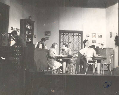 The ASUI production of "The Time of Your Life." Marvin Alexander as Willie, James Ford as Nick, Lois Winter as Elsie, John Miller as Dudley, Tom Robinson as Harry and Don McDonald as Wesley. Directed by Jean Collette in the University Auditorium.