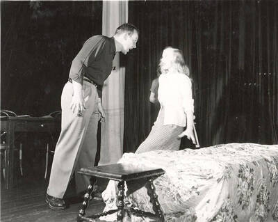 Richard Pennell as Tom and Lorraine Cole as Amanda during rehearsal for the ASUI production of "The Glass Menagerie." Directed by Jean Collette.