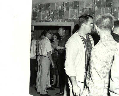 Students talk during a break at the Alpha Phi Nickel Hop.
