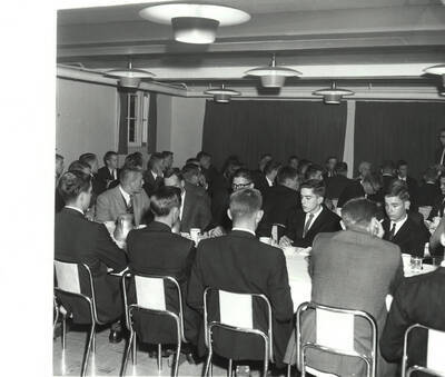 Current and potential members of Phi Delta Theta listen to a current member speak during Rush week.