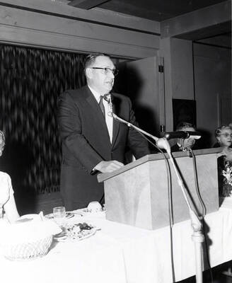 State representative George Crookham issues the principal speech at the 37th National Convention of Intercollegiate Knights, a national honorary service organization.