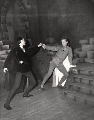 Tom Wright (right) as Laertes and Fred Burton as Hamlet in ASUI production of 'Hamlet.' Directed by Jean Collette, costumes by Joan Coble (Judy Chavez) in the University Auditorium.