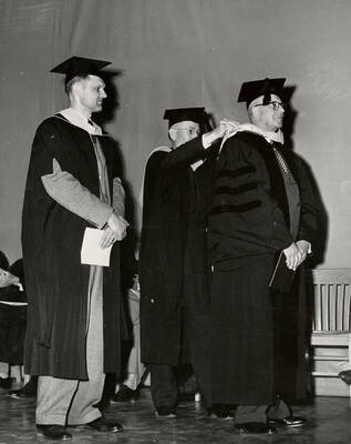 William Perkins receiving an honorary degree during the 1952 Commencement ceremony.