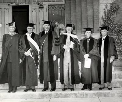 University of Idaho President Jesse Buchanan, Harry W. Morrison, Stanly Easton, James W. Girard, Dean Iddings and Governor C.A. Robins stand together on the Administration Building steps for the 1950 Commencement.