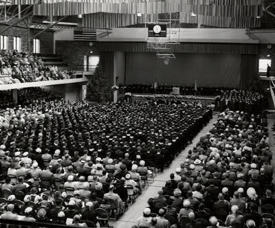 The 1953 Commencement audience sits facing the stage in the Memorial Gym.